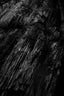 vertical-grey-scale-shot-patterns-rocky-cliffs.jpg